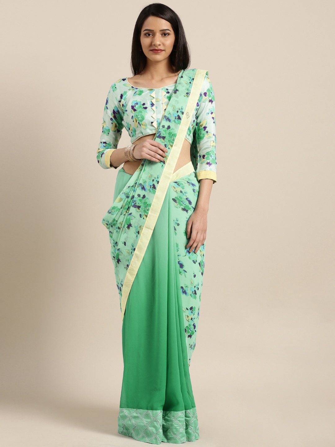 

Shaily Green Printed Pure Georgette Saree