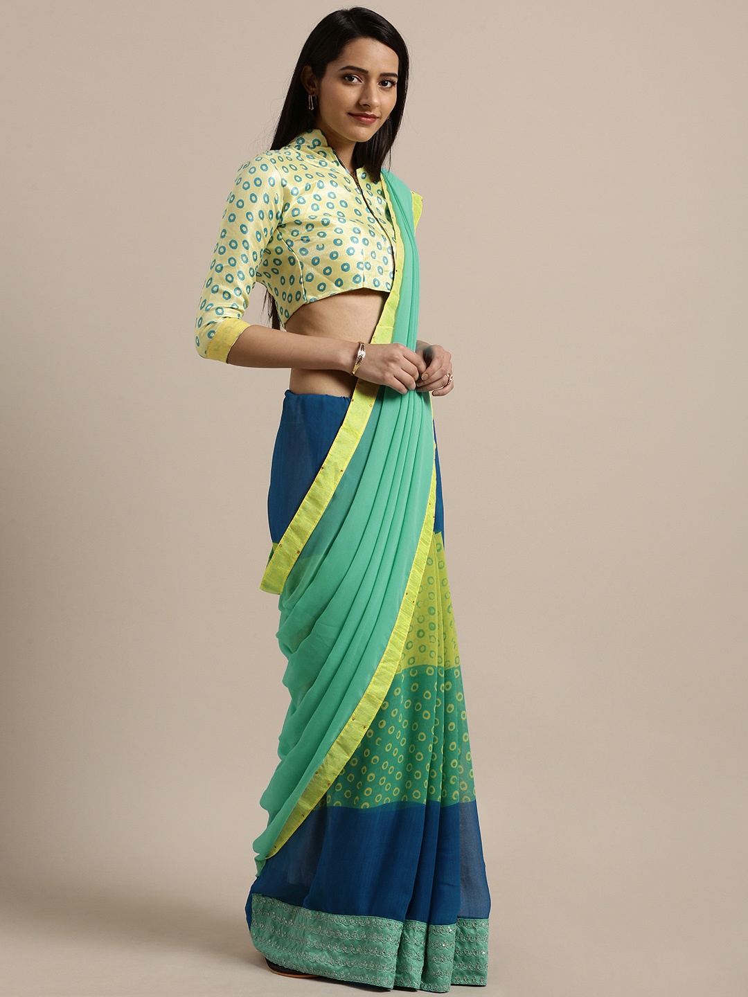 

Shaily Turquoise Blue Colourblocked Pure Georgette Saree