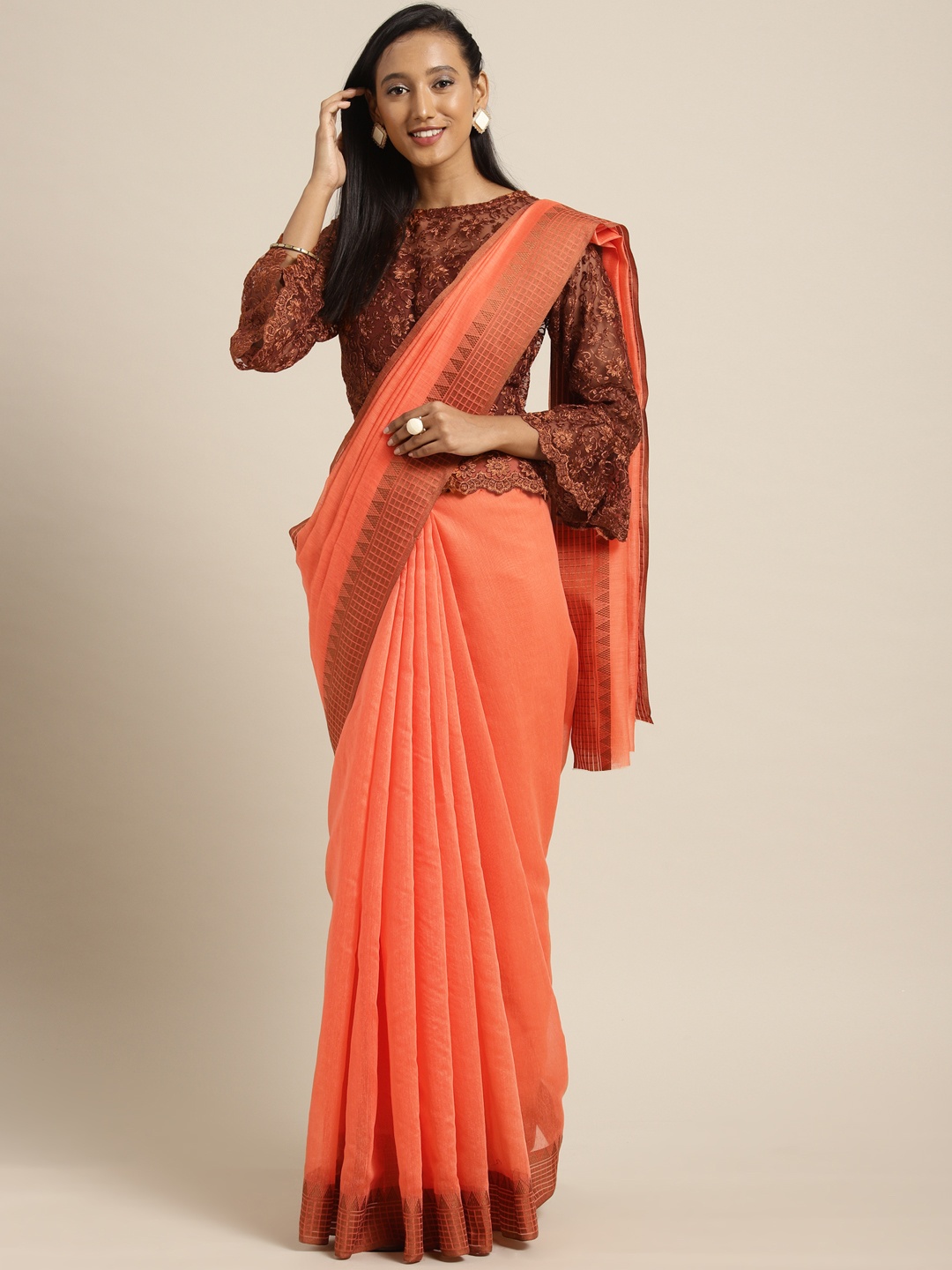 

Shaily Orange Embellished Linen Lace Work Saree