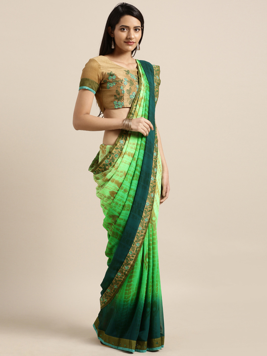 

Shaily Green Printed Pure Georgette Saree