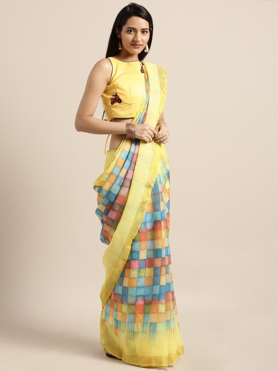 

Shaily Yellow & Blue Printed Pure Linen Saree