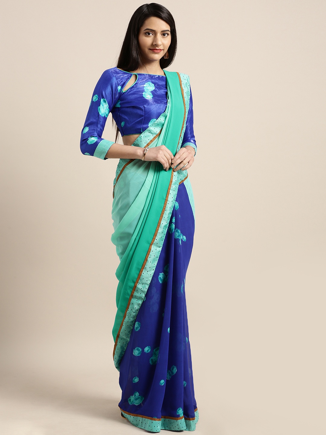 

Shaily Turquoise Blue Solid Pure Georgette Saree