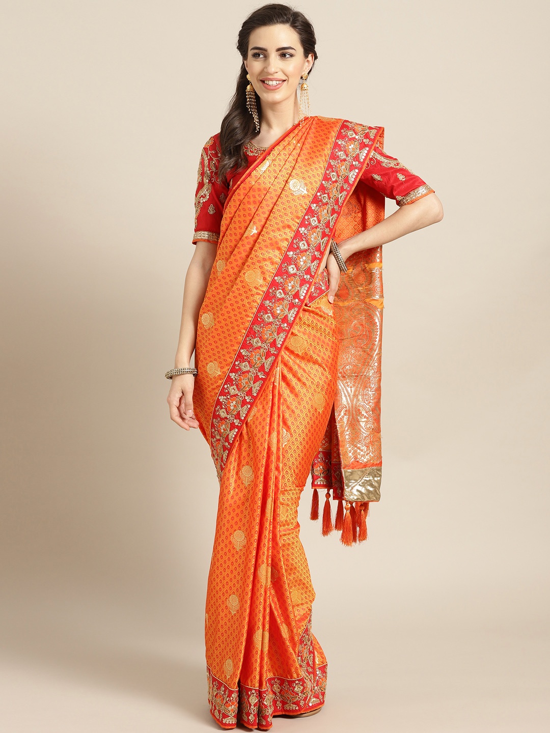 

MANOHARI Orange & Golden Woven Design Saree