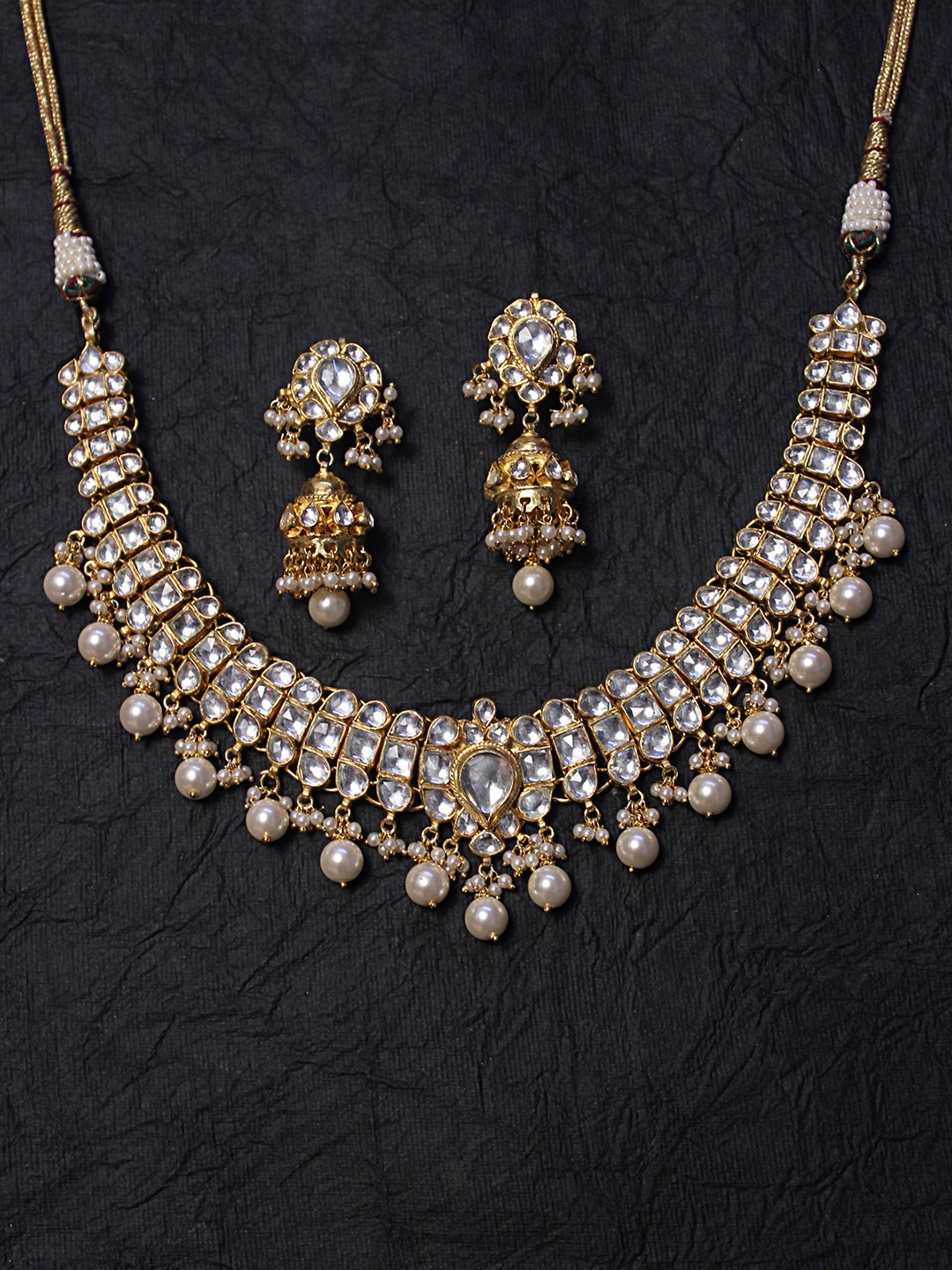 

AccessHer Gold-Plated Pachi Kundan and Pearl -Studded Handcrafted Jadua Jewellery Set