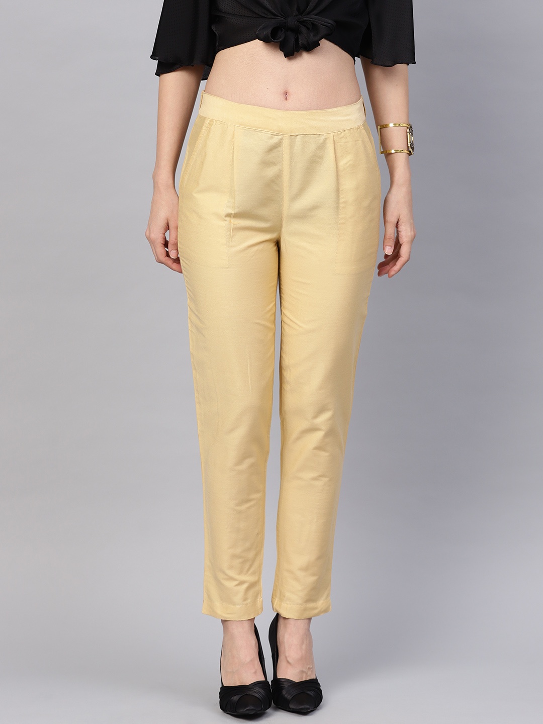 

Jaipur Kurti Women Beige Regular Fit Solid Regular Trousers