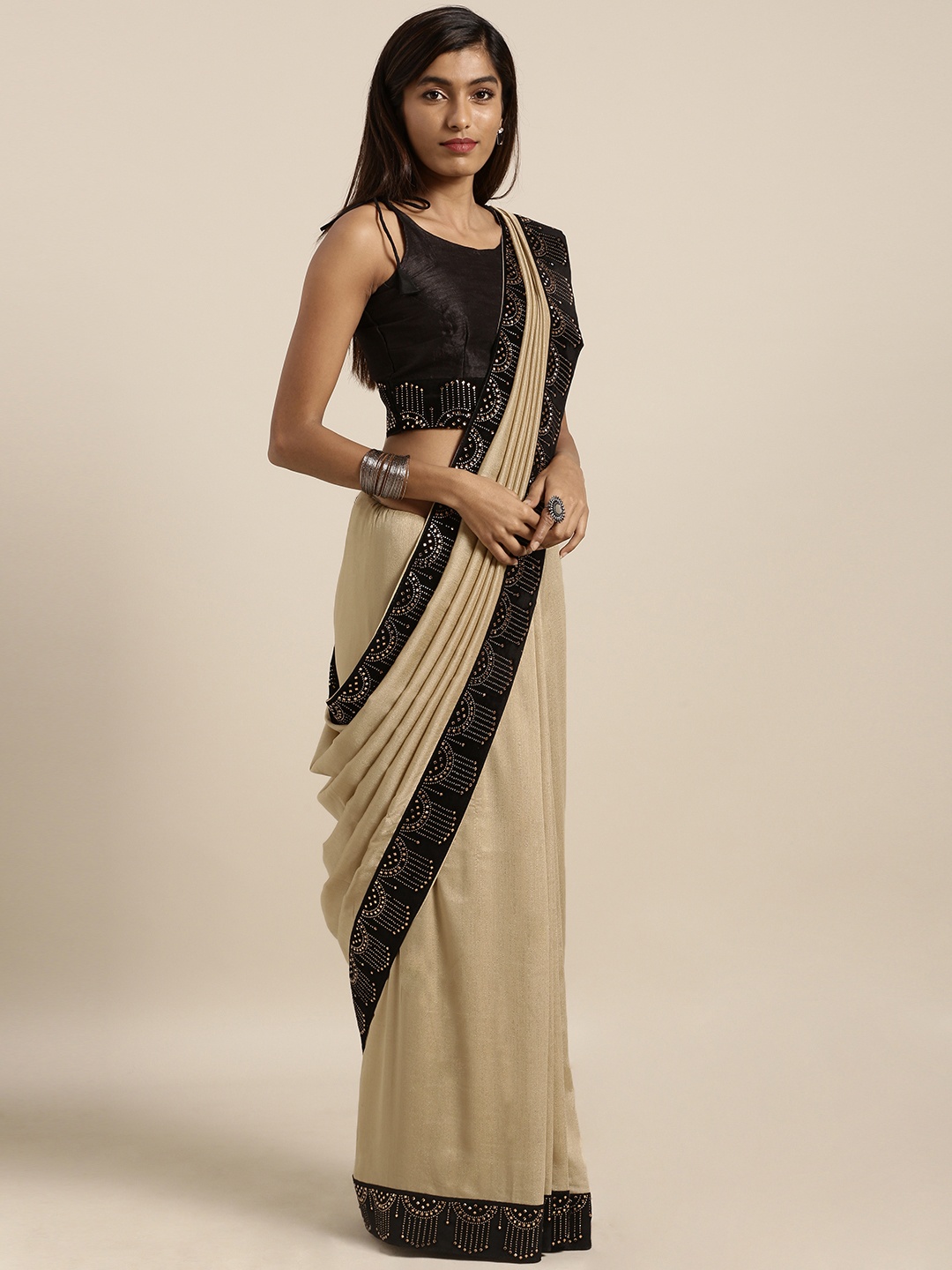 

MIRCHI FASHION Beige & Black Silk Blend Solid Saree with Embellished Border