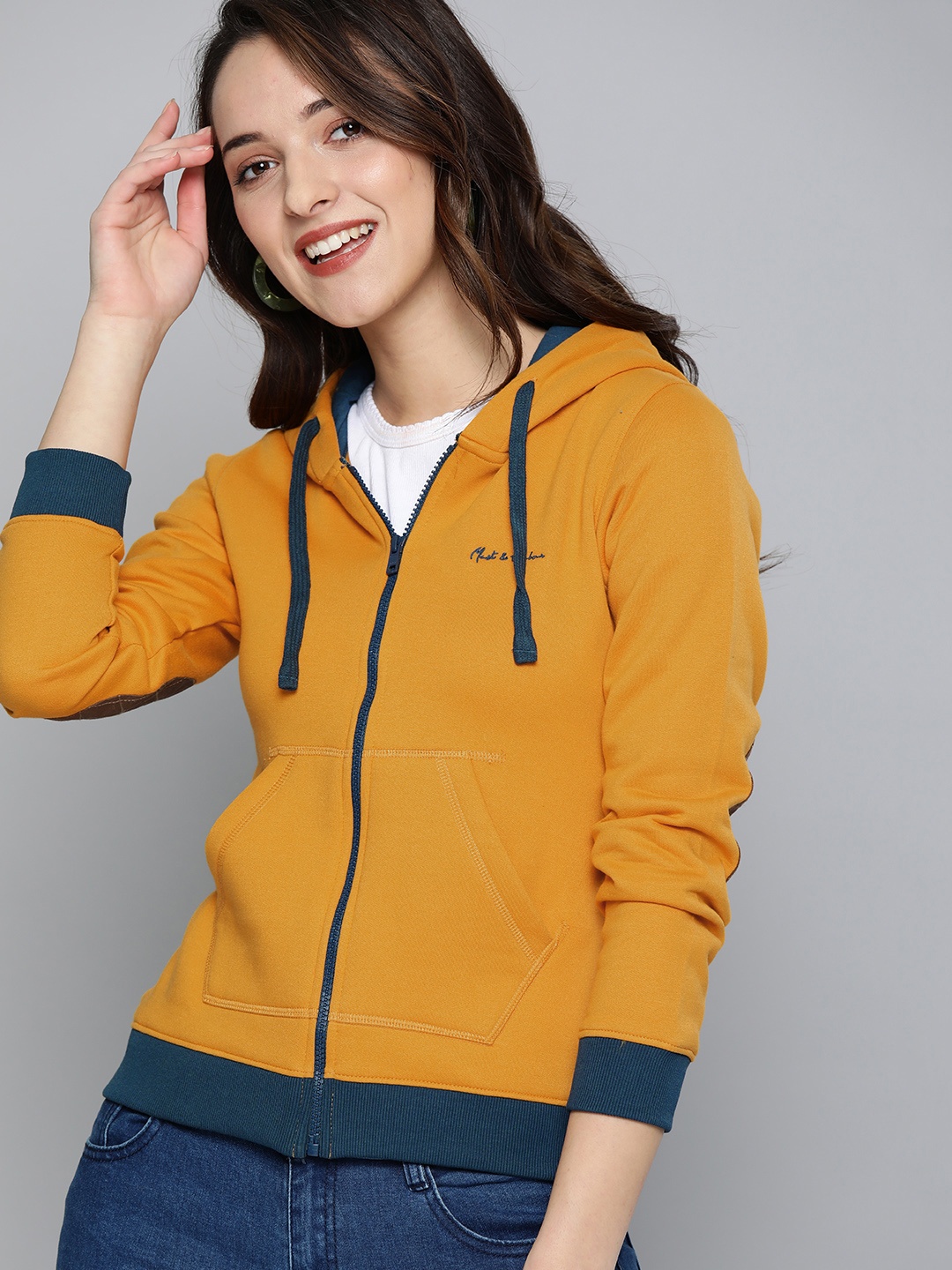 

Mast & Harbour Women Mustard Yellow Solid Hooded Sweatshirt