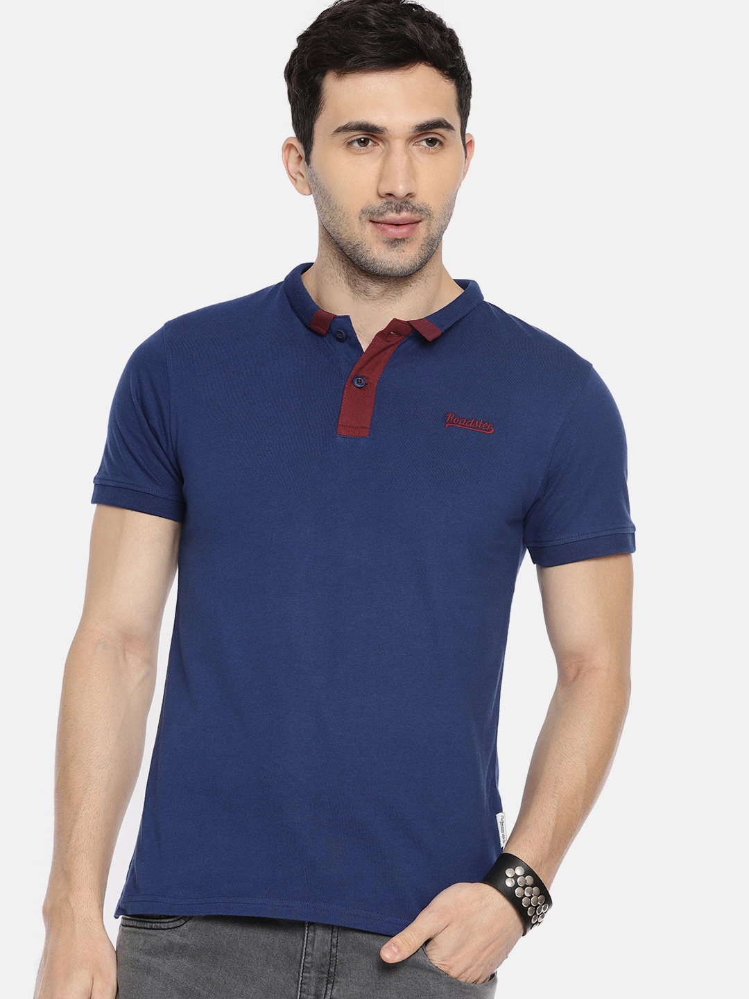 

The Roadster Lifestyle Co Men Navy Blue Solid Polo Collar Pure Cotton T-shirt