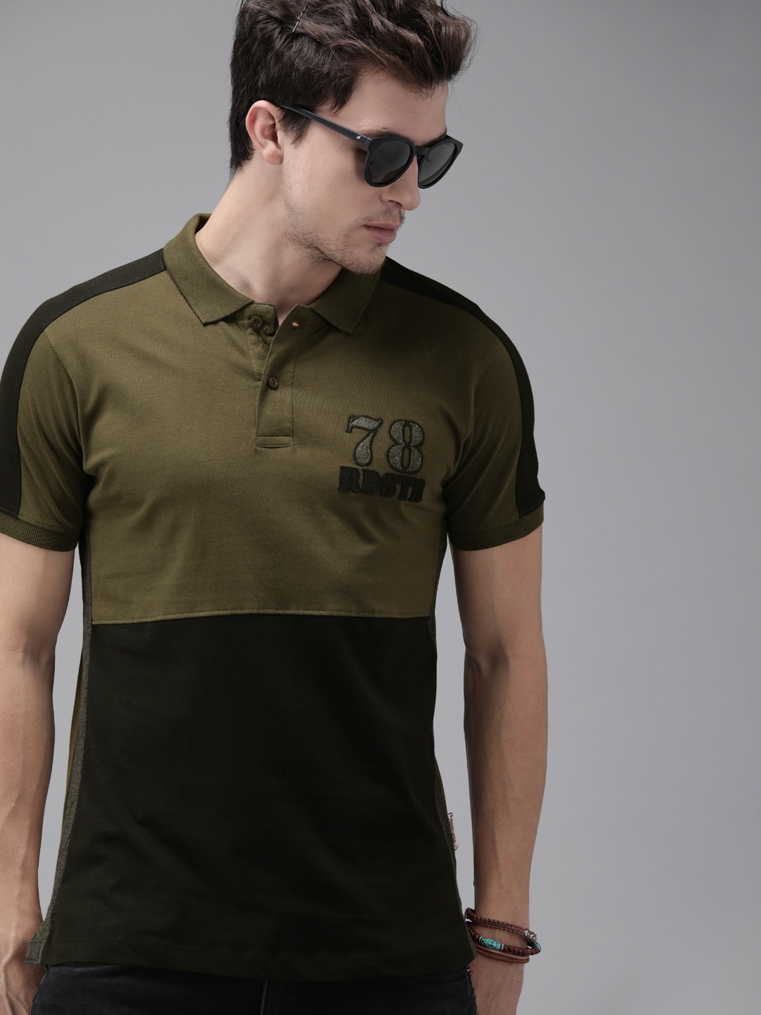 

The Roadster Lifestyle Co Men Olive Green & Black Colourblocked Polo Collar T-shirt