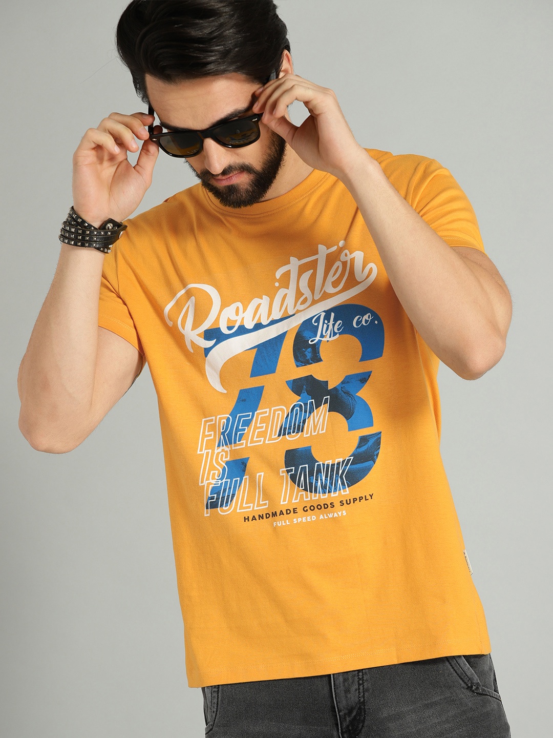 

The Roadster Lifestyle Co Men Mustard Yellow Printed Round Neck Pure Cotton T-shirt