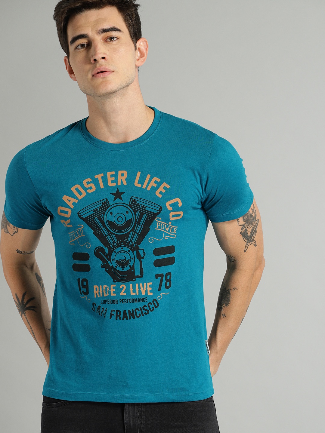 

The Roadster Lifestyle Co Men Teal Printed Round Neck Pure Cotton T-shirt