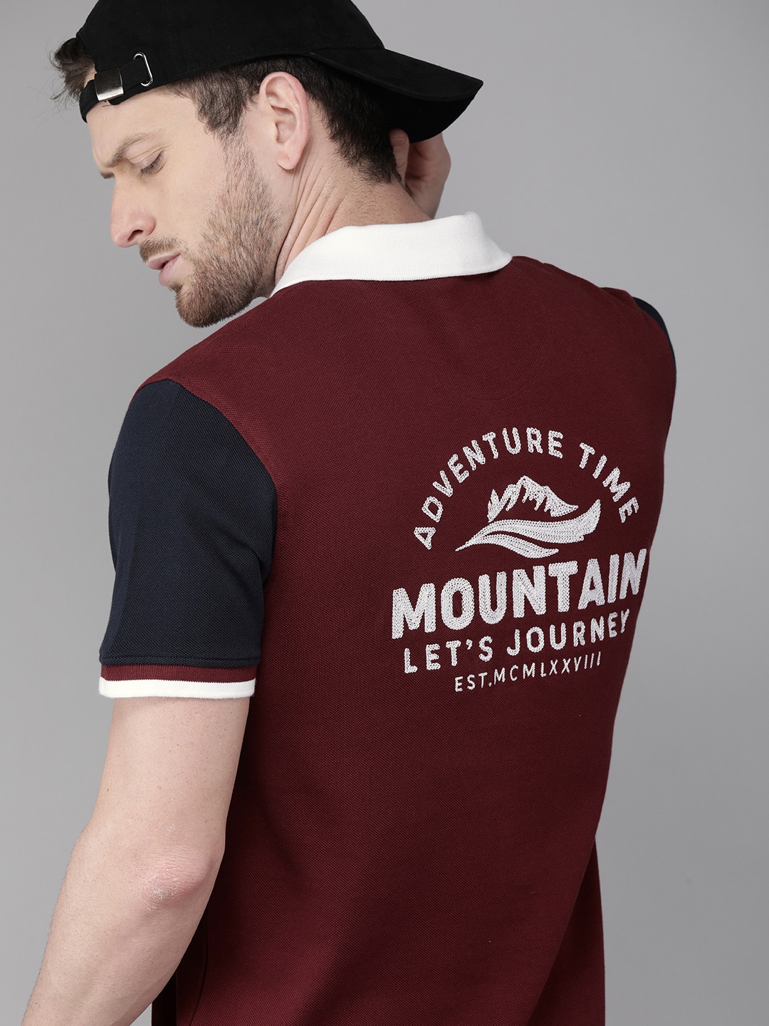 

The Roadster Lifestyle Co Men Maroon Back Printed Polo Collar Pure Cotton T-shirt