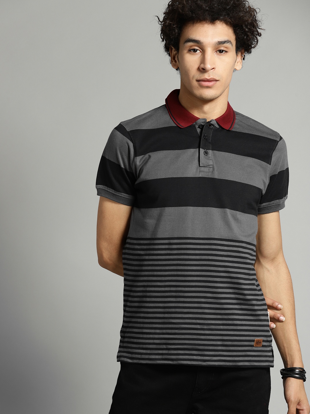 

The Roadster Lifestyle Co Men Charcoal Grey & Black Striped Polo Collar T-shirt