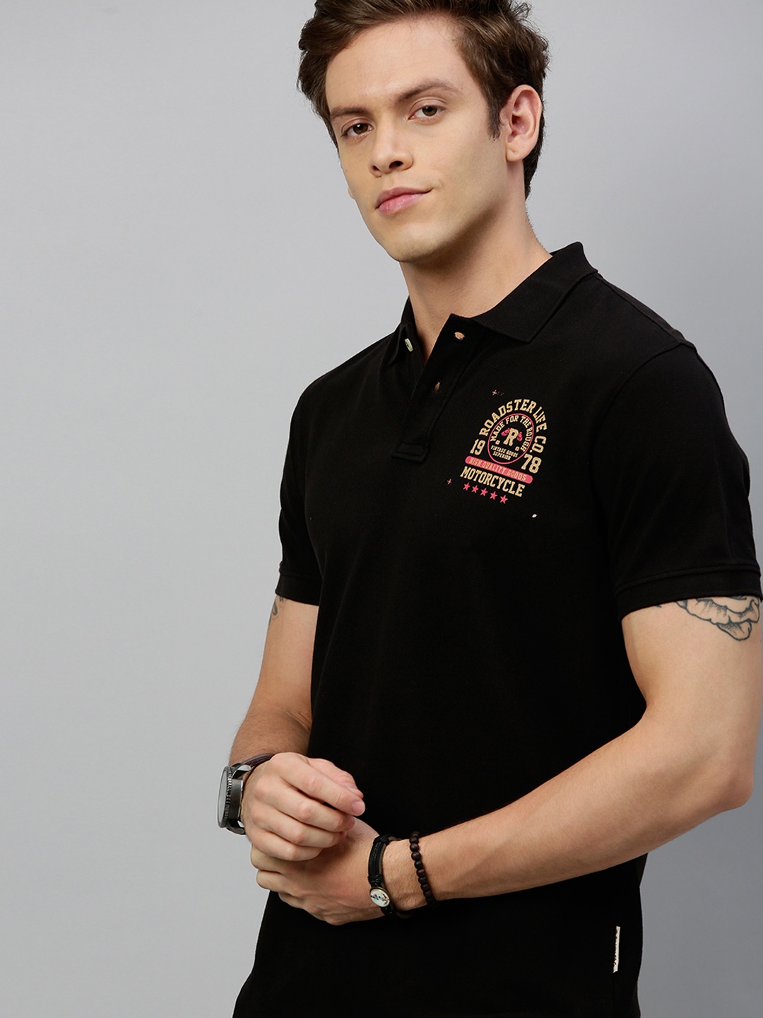 

Roadster Men Black Solid Polo Collar Pure Cotton T-shirt