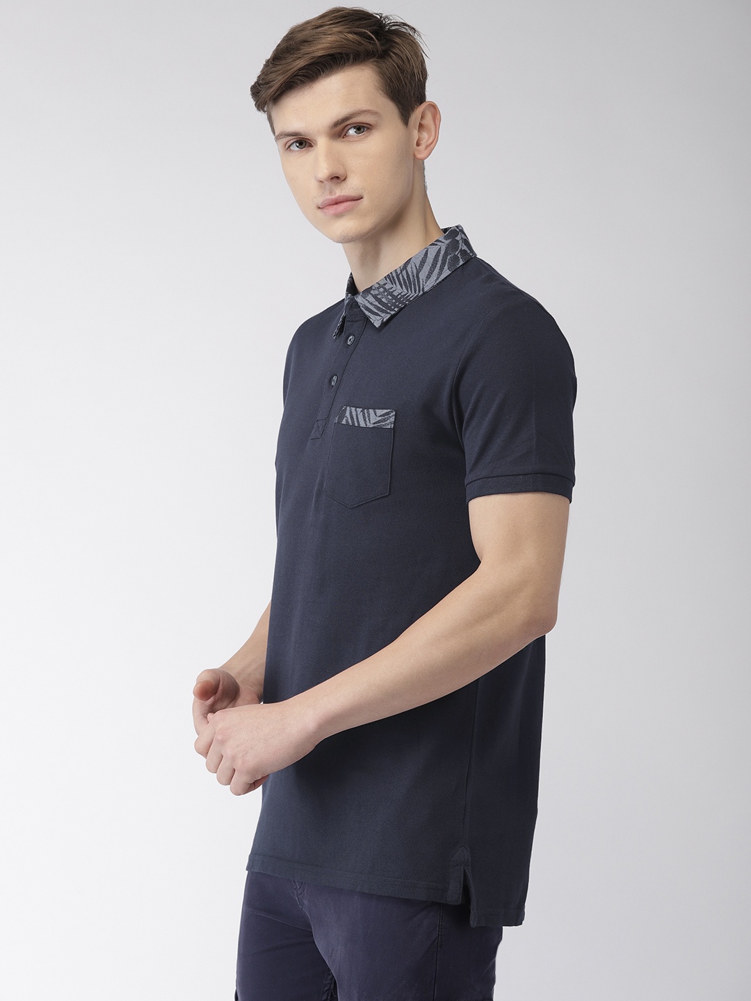 

Celio Men Navy Blue Solid Polo Pure Cotton T-shirt