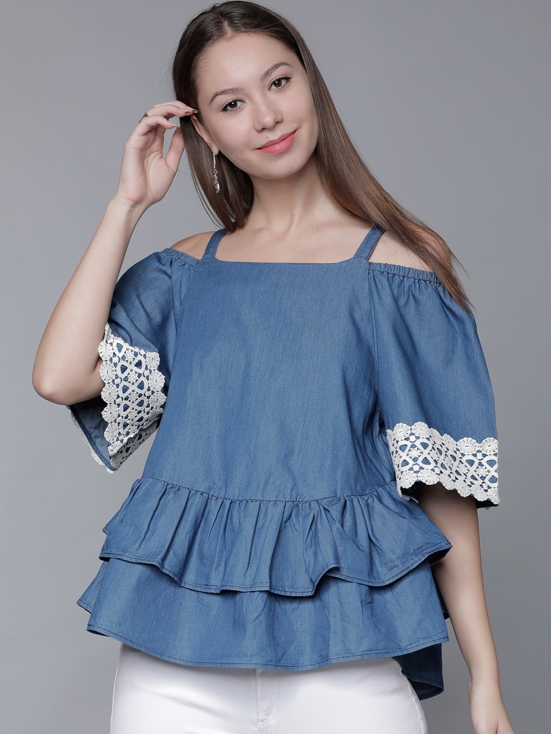 

Tokyo Talkies Women Blue Solid Peplum Top