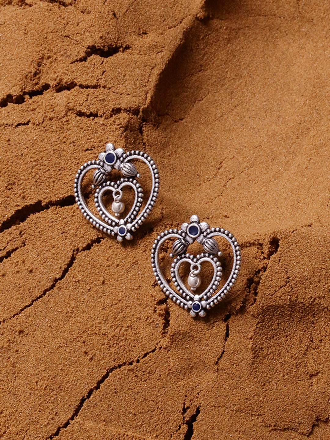 

Voylla Silver-Toned Heart Shaped Studs