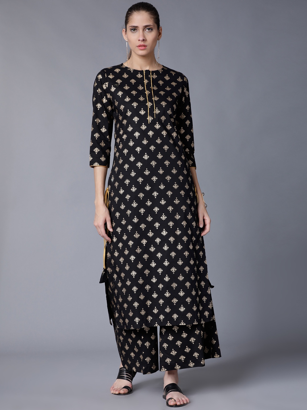 

Vishudh Women Black & Gold-Toned Printed Kurti with Palazzos