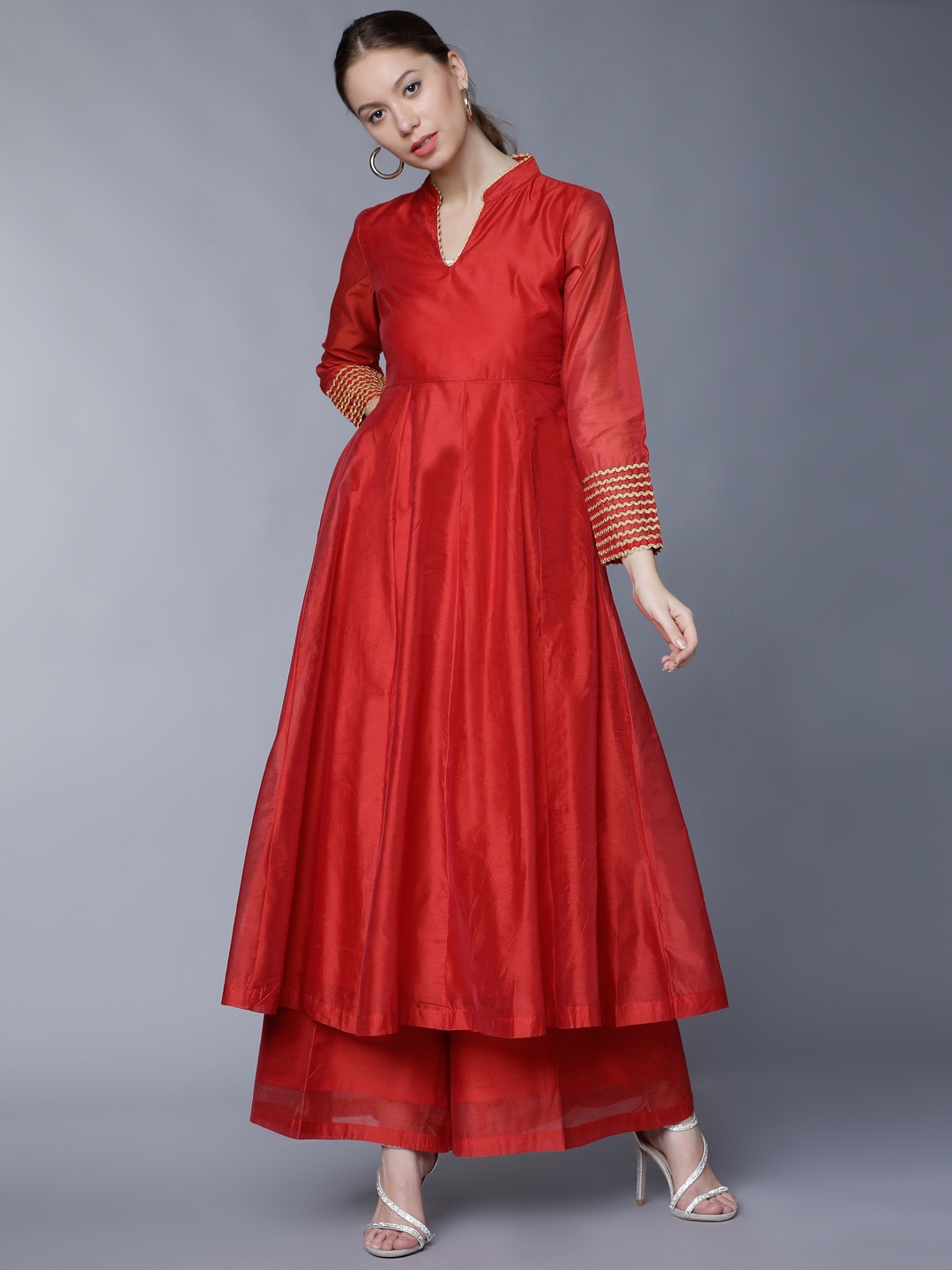 

Vishudh Women Red Solid Anarkali Kurta with Palazzos
