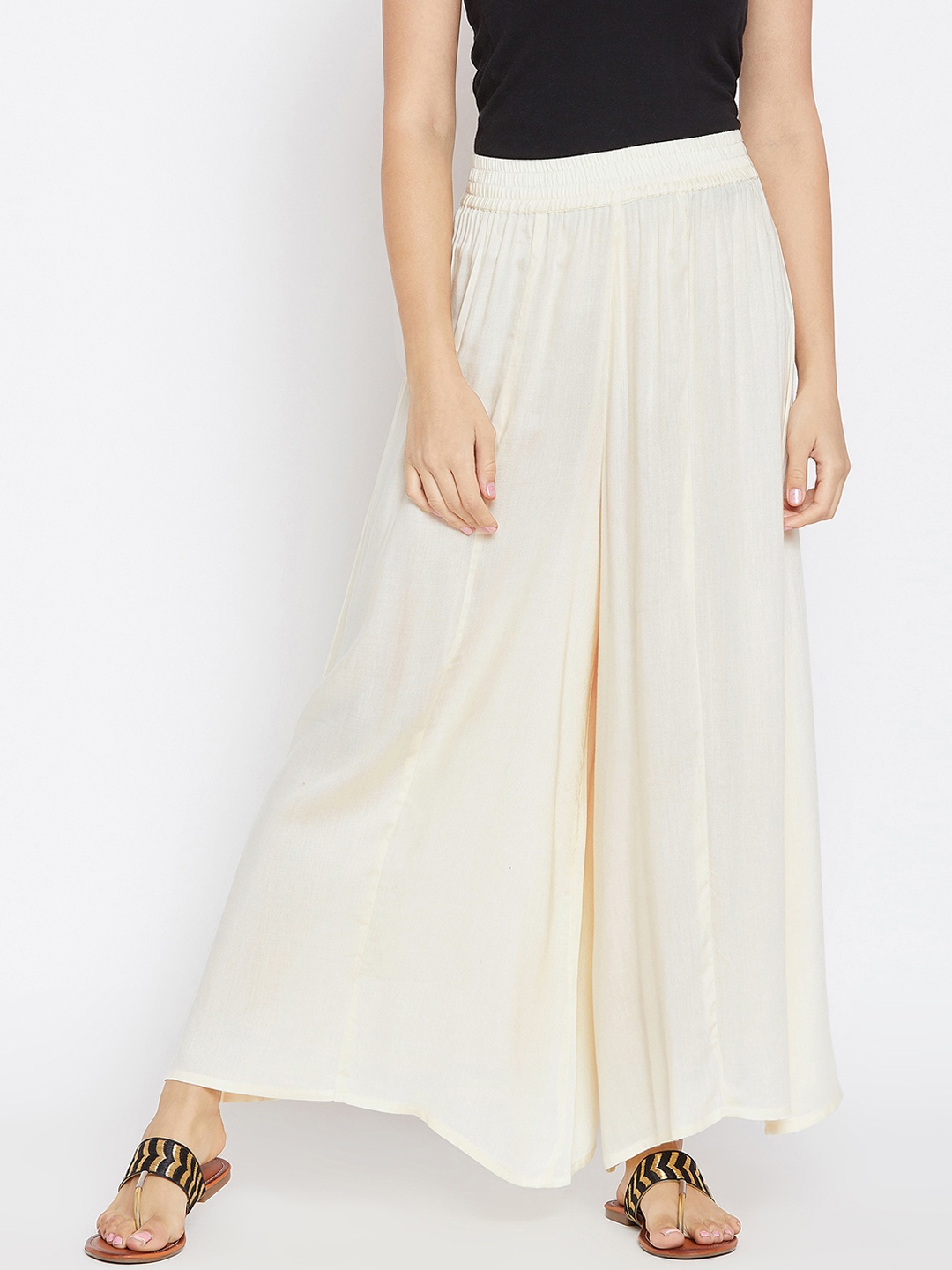 

PANIT Women Off-White Flared Solid Palazzos