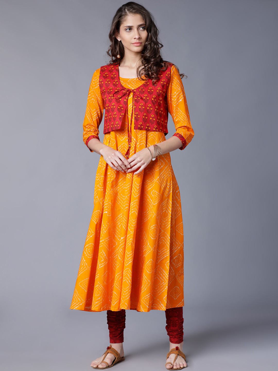 

Vishudh Women Yellow & Red Printed Anarkali Kurta