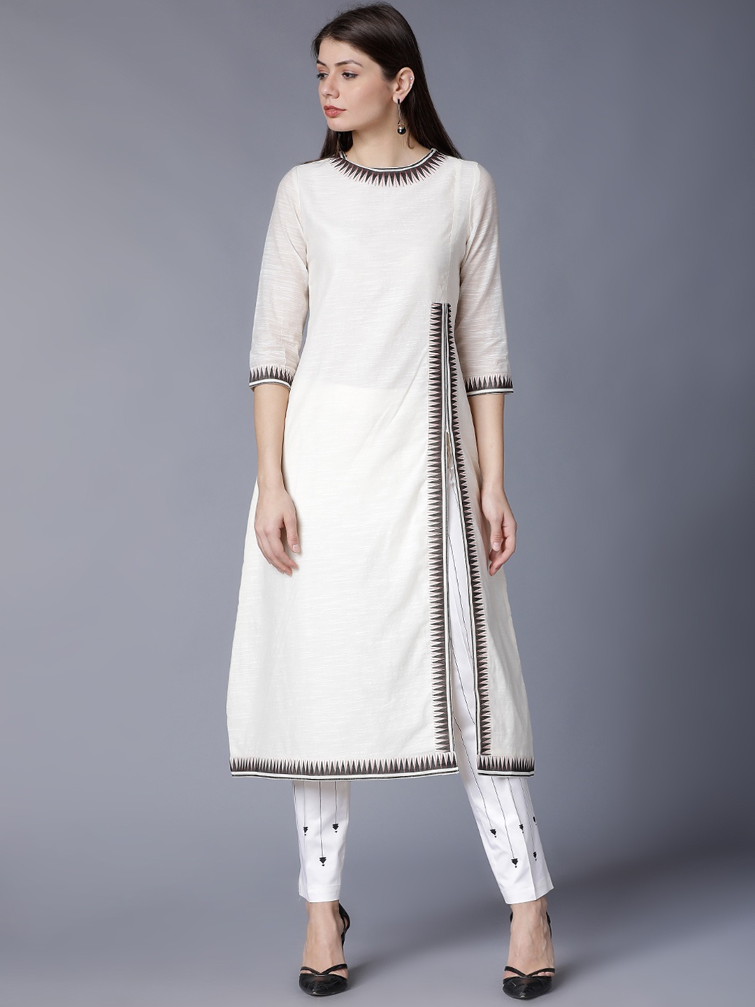 

Vishudh Women Cream-Coloured Solid Kurti with Palazzos