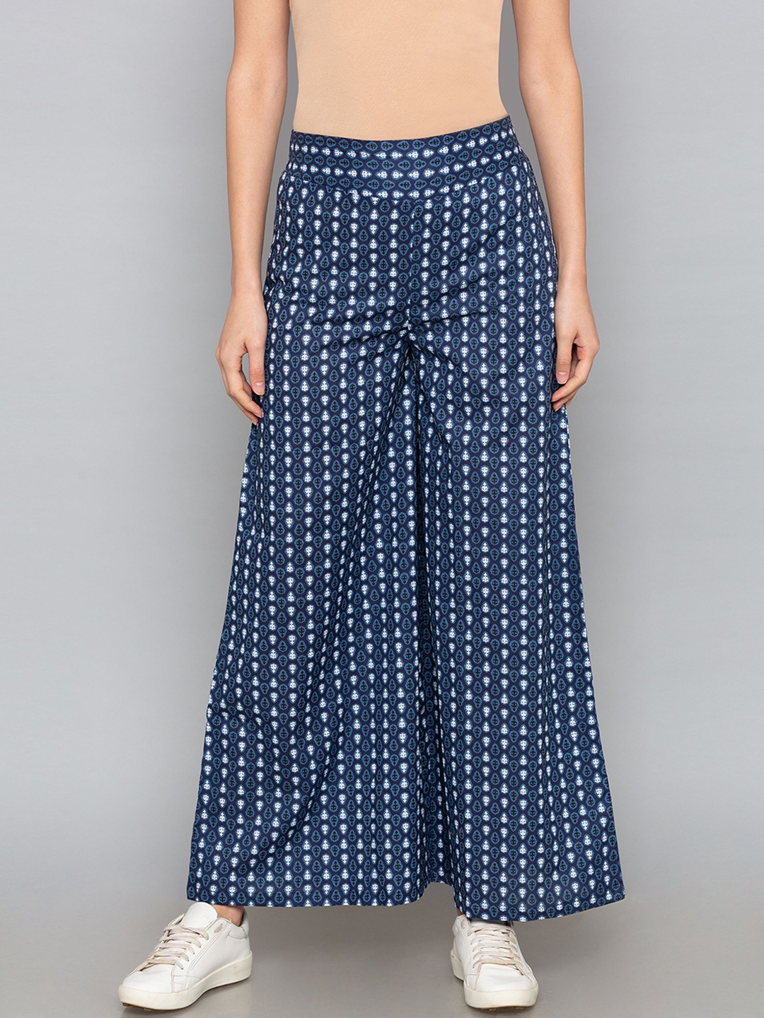 

Desi Weavess Women Blue & Off-White Printed Flared Palazzos