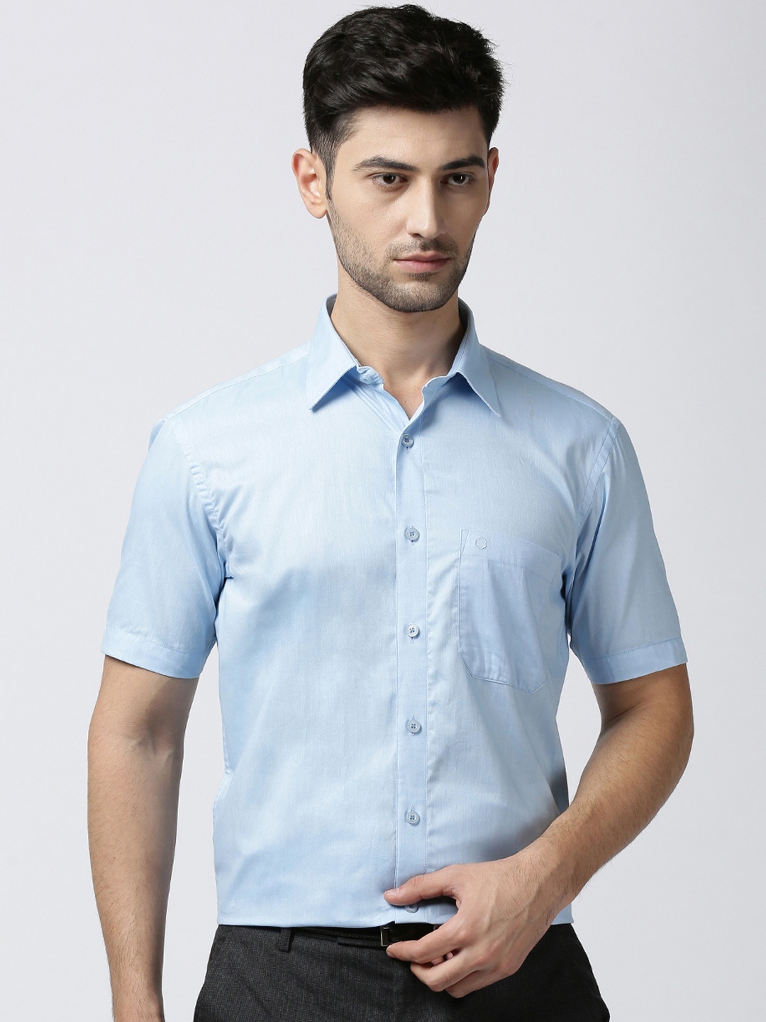 

Jansons Men Blue Regular Fit Solid Formal Shirt