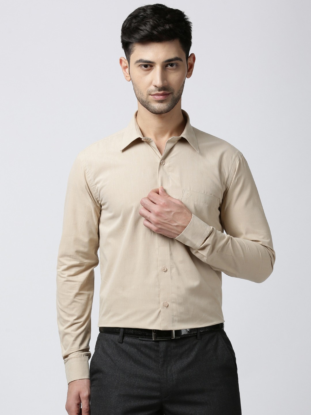 

Jansons Men Beige Regular Fit Solid Formal Shirt