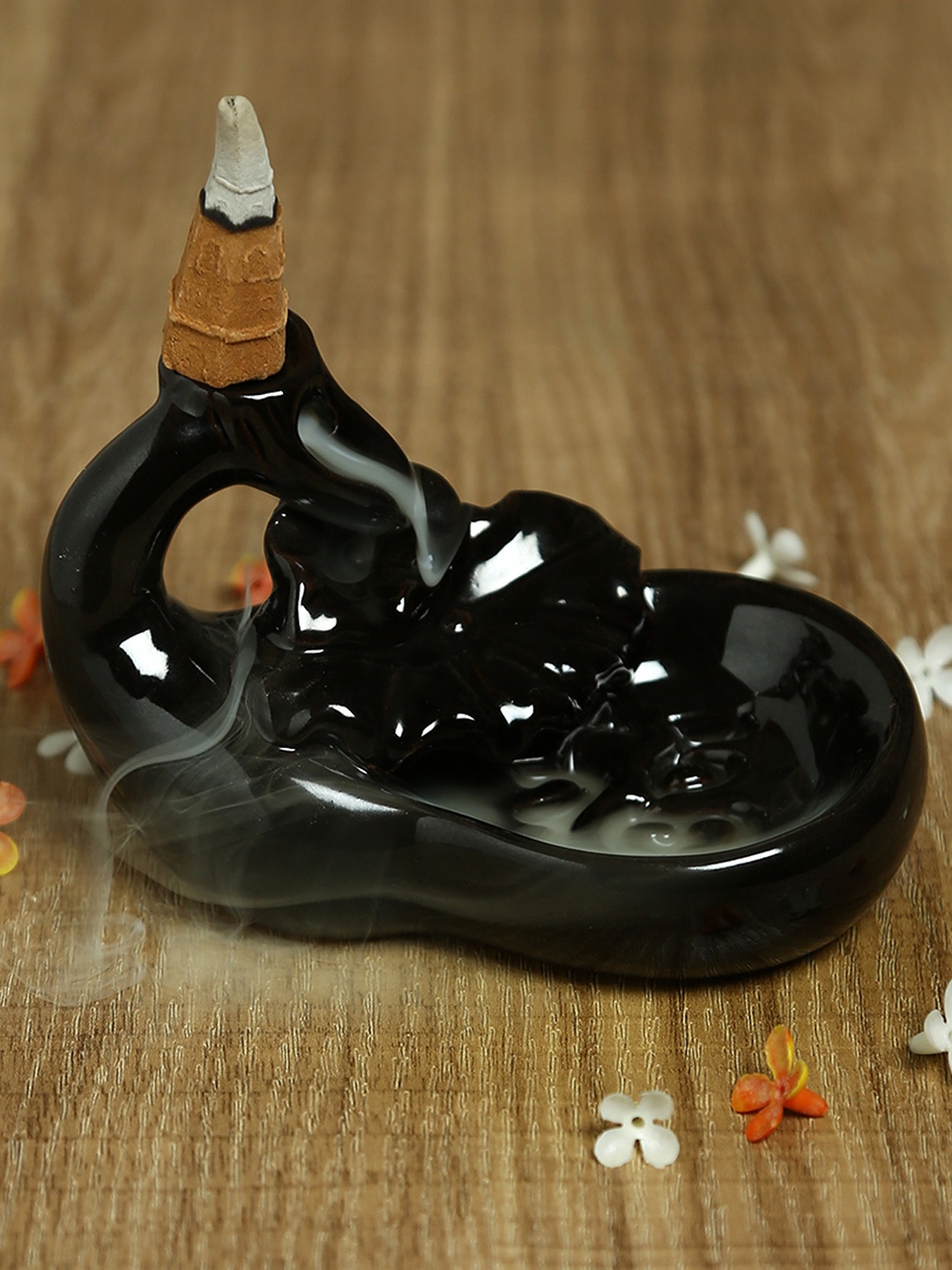 

Aapno Rajasthan Black Resin Smoke Fountain with Backflow Incense Cone