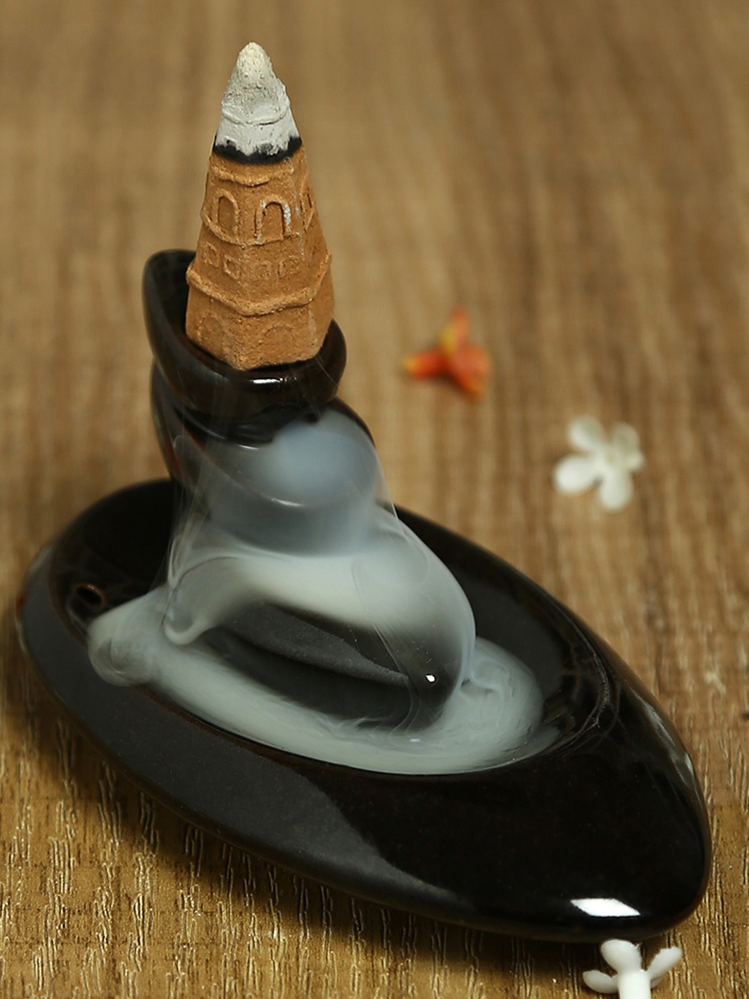 

Aapno Rajasthan Black Resin Smoke Fountain with Backflow Incense Cone