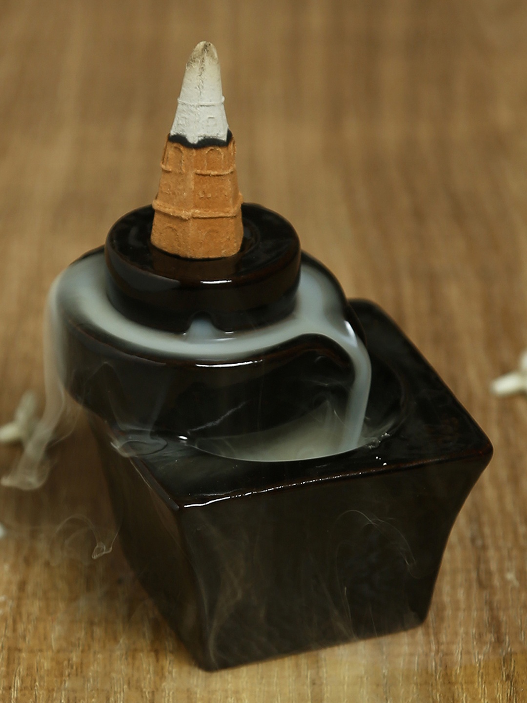 

Aapno Rajasthan Black Resin Smoke Fountain with Backflow Incense Cone