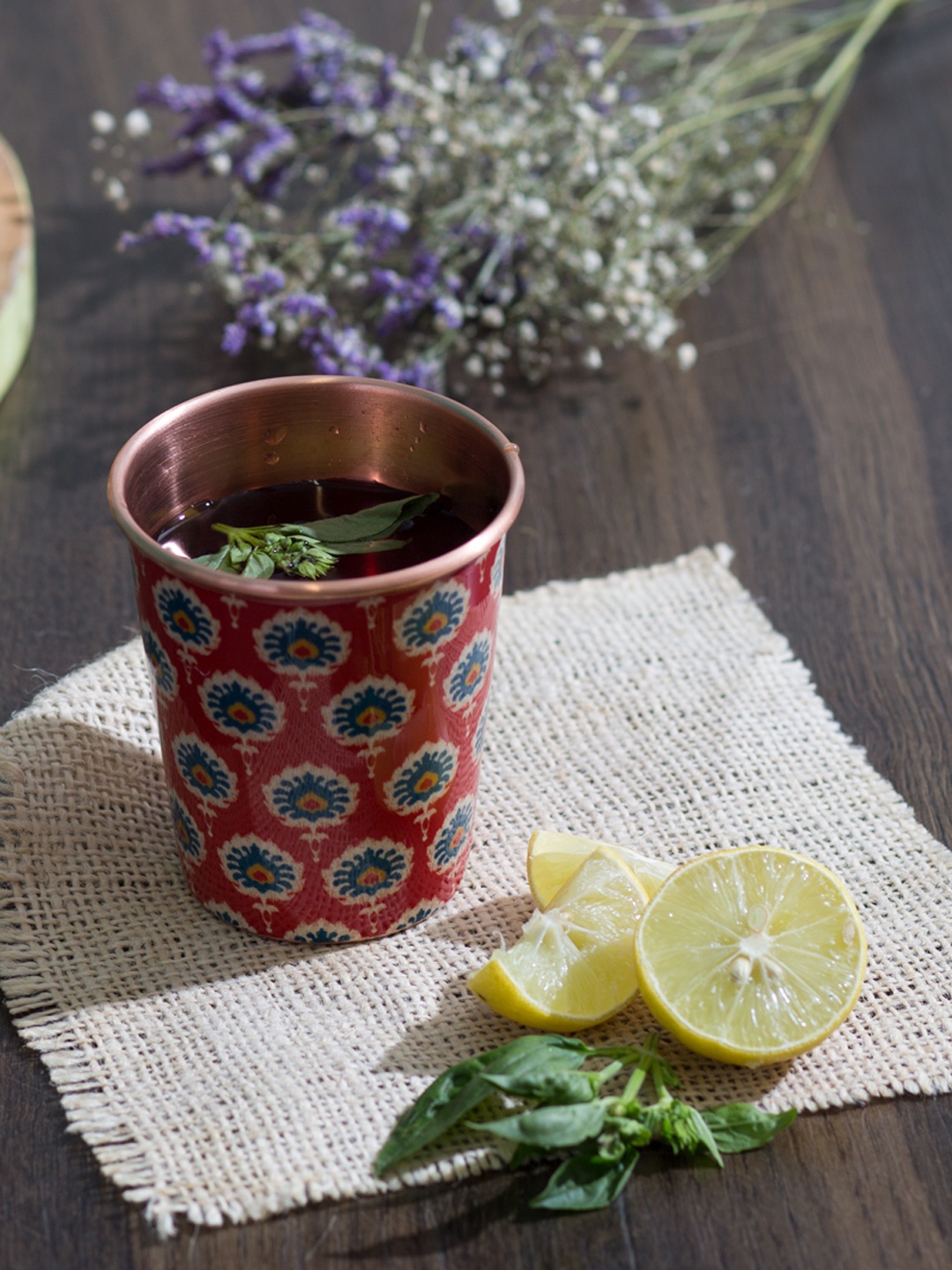 

Chumbak Red Printed Copper Glass
