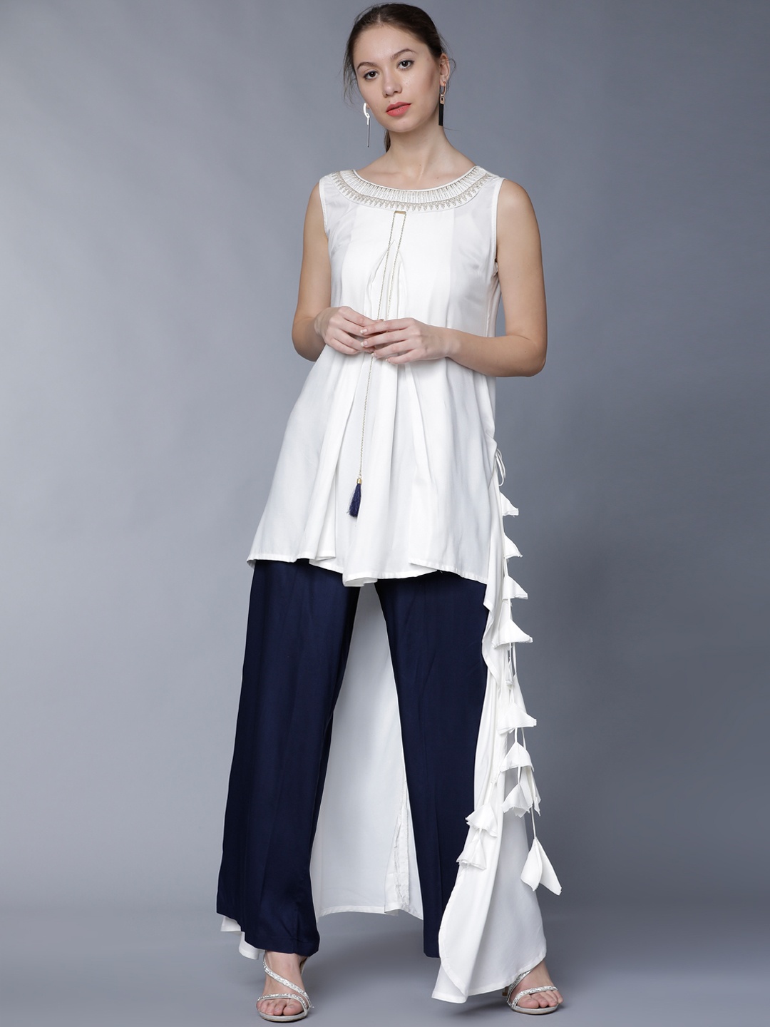 

Vishudh Women White & Navy Blue Solid Kurta with Palazzos