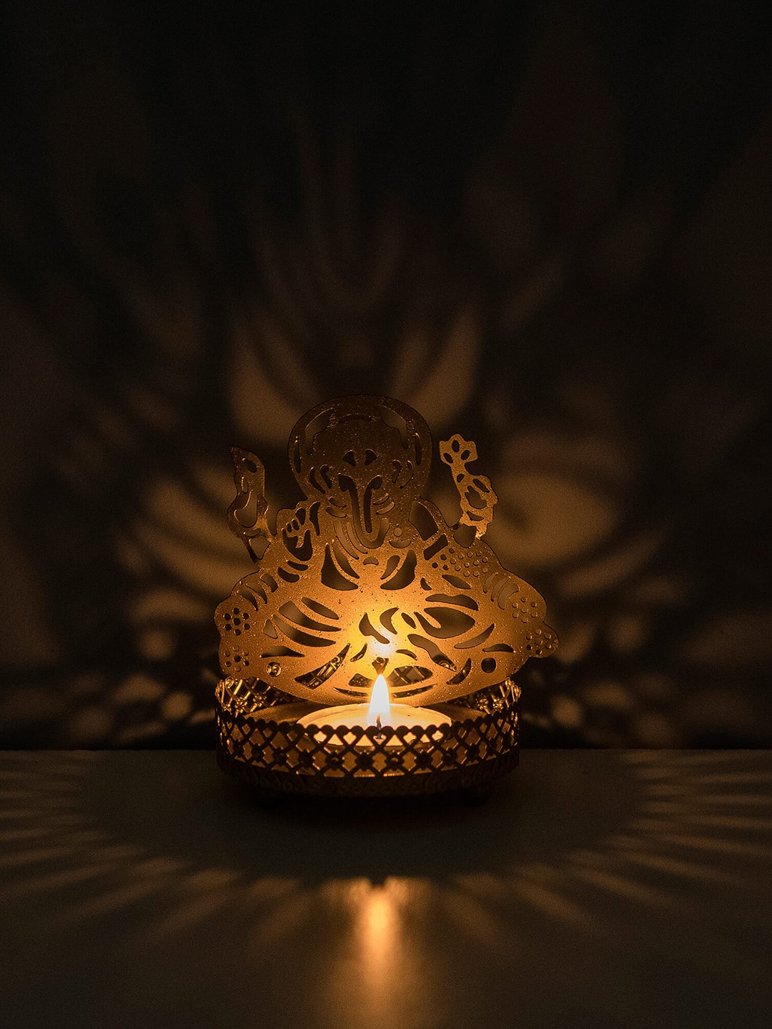 

Homesake Set of 2 Shadow Sri Ganesh Candle Holder with Free Wax Diya, Gold