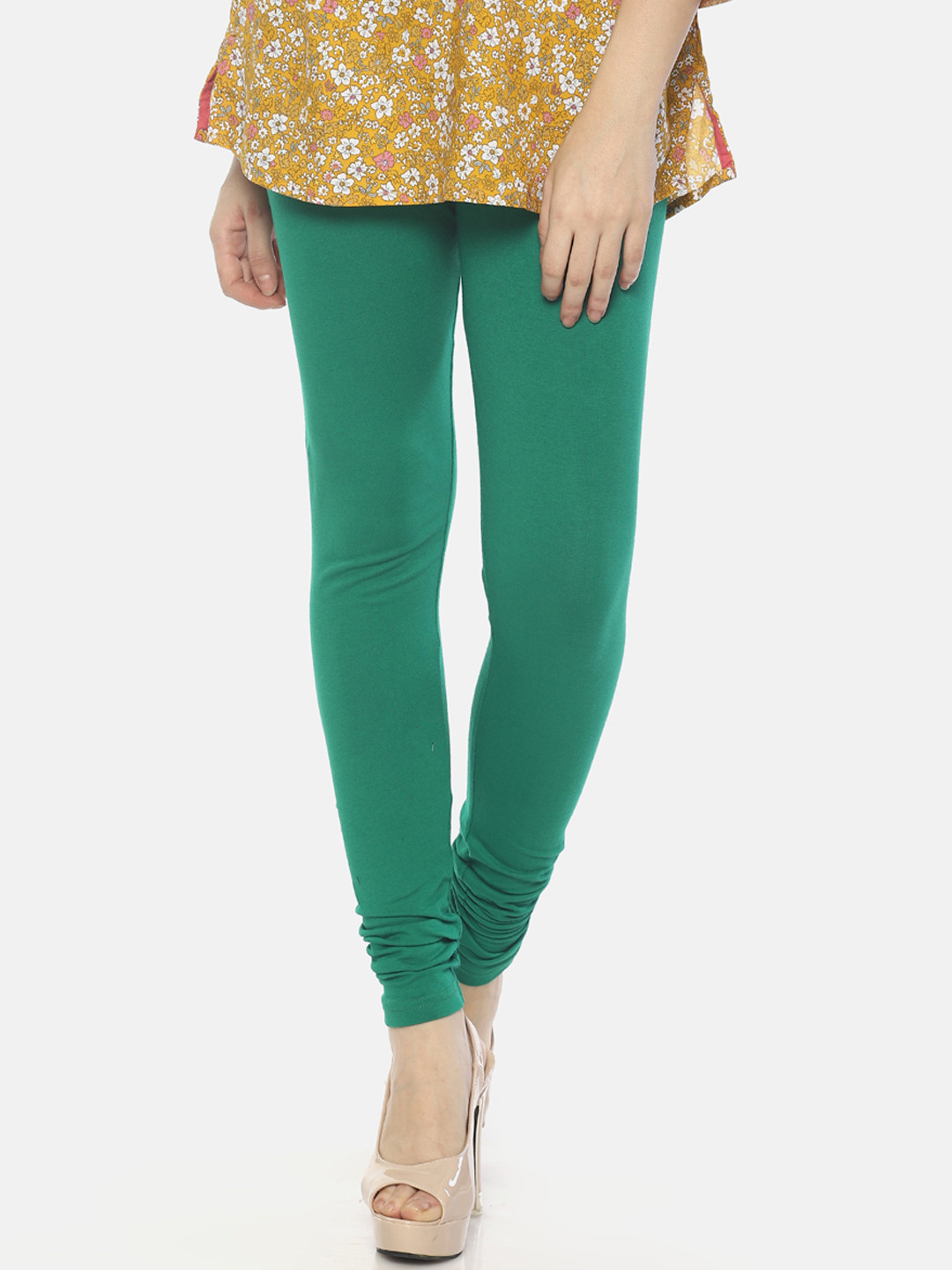 

Mytri Women Green Solid Slim-Fit Churidar Leggings