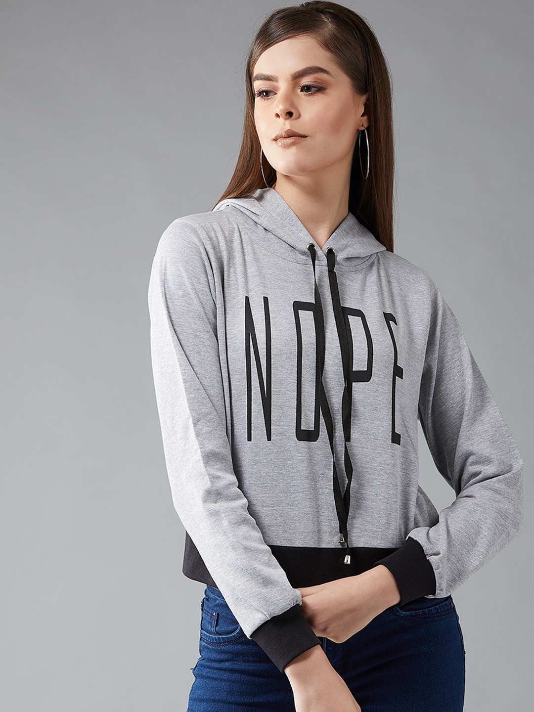 

DOLCE CRUDO Women Grey Solid Hooded Sweatshirt