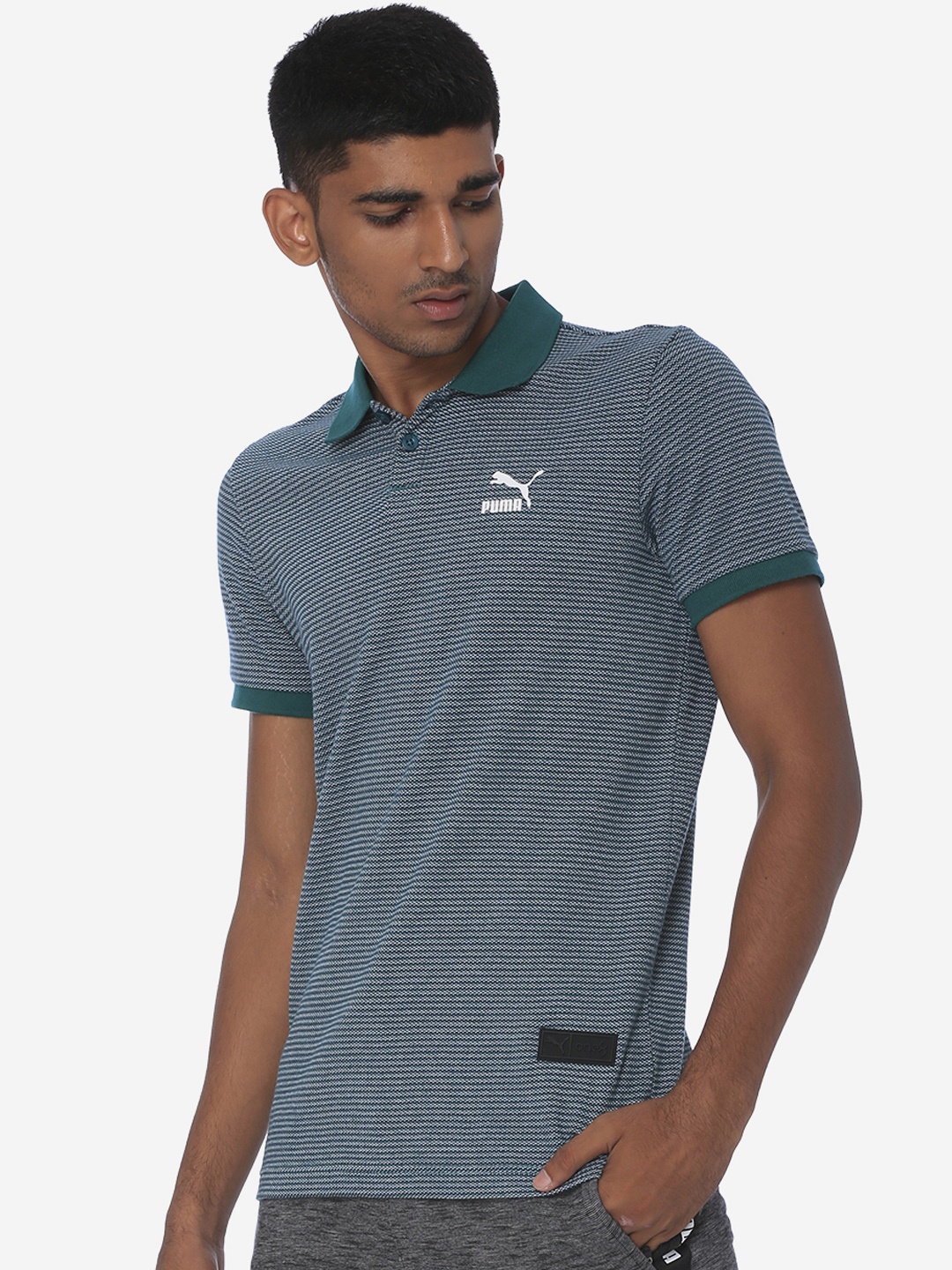

Puma Men Green Self Design Polo Collar VK Polo II Heather Sports T-shirt