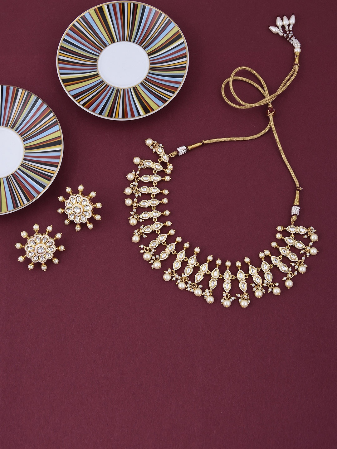 

Tistabene Women Gold-Plated & Cream-Coloured Enamelled Stone-Studded Jewellery Set