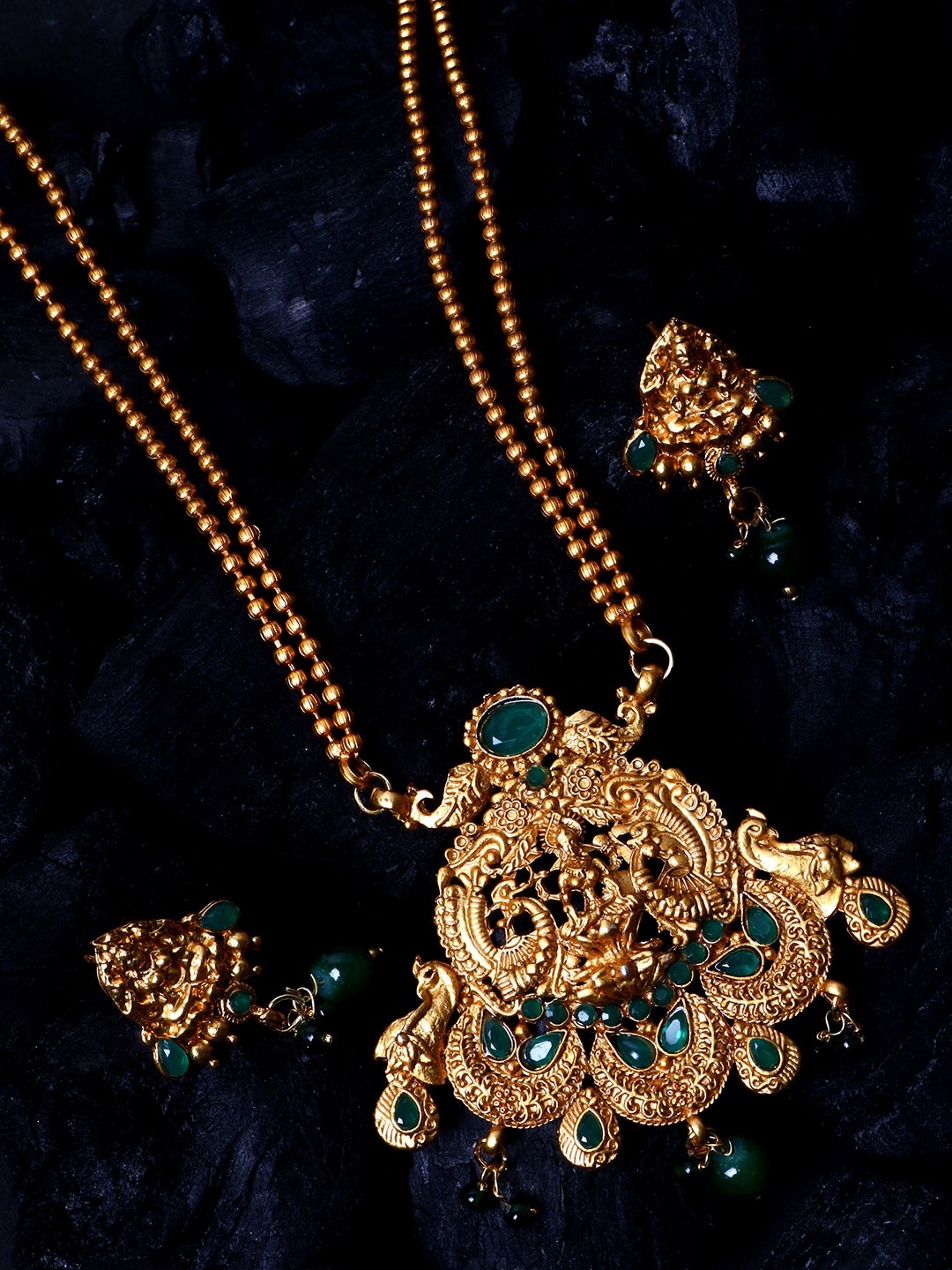 

ANIKAS CREATION Women Gold-Plated & Green Stone-Studded Temple Jewellery Set