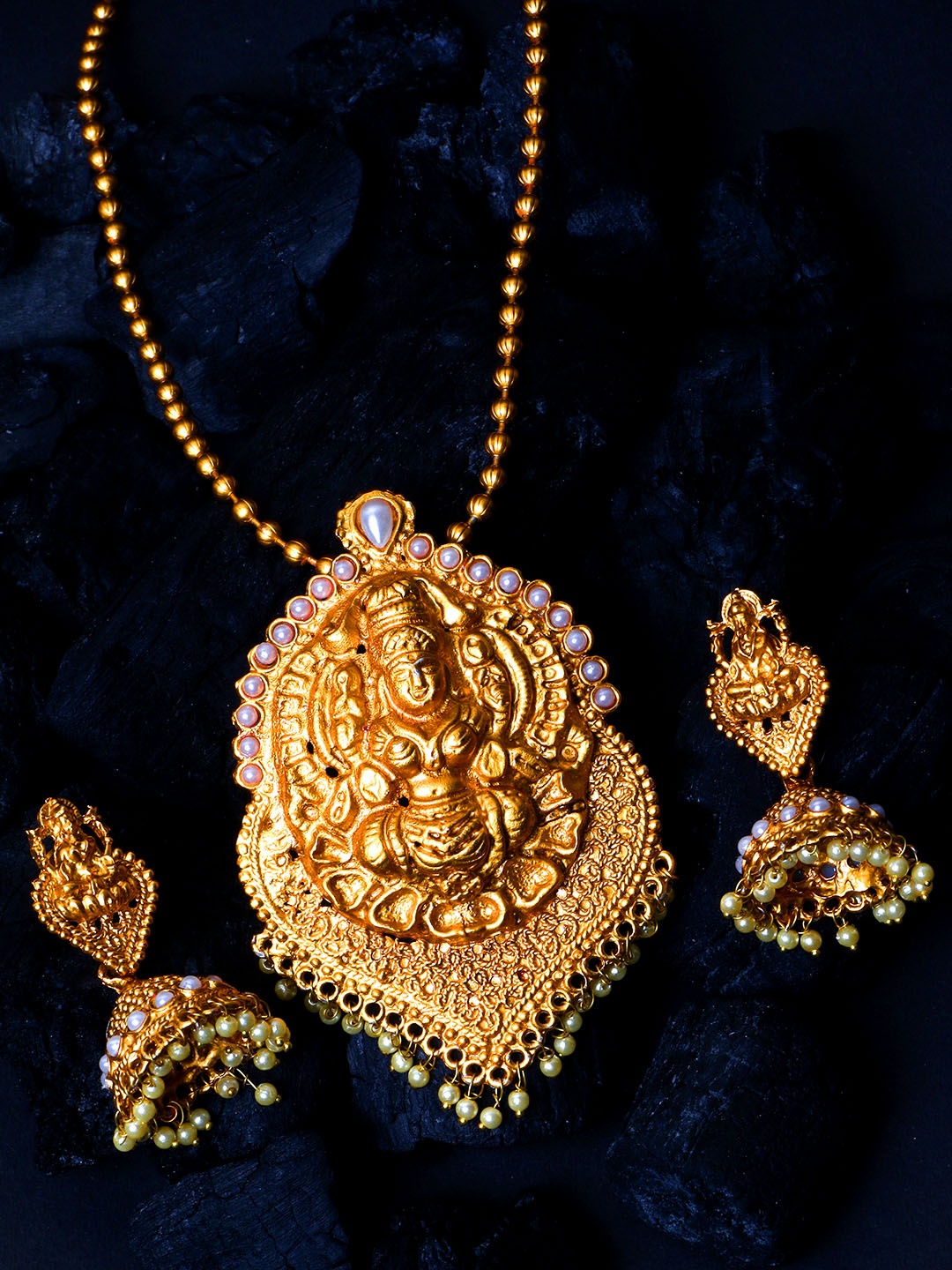 

ANIKAS CREATION Women Gold-Plated & White Stone-Studded Temple Jewellery Set