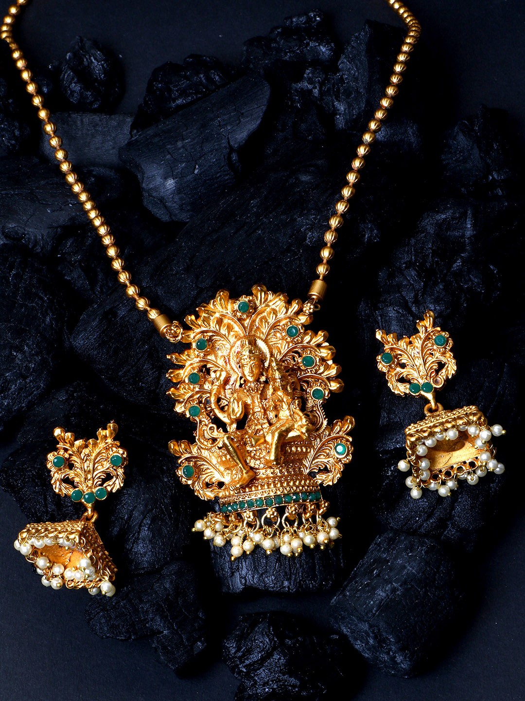 

ANIKAS CREATION Women Gold-Plated & Green Stone-Studded Temple Jewellery Set