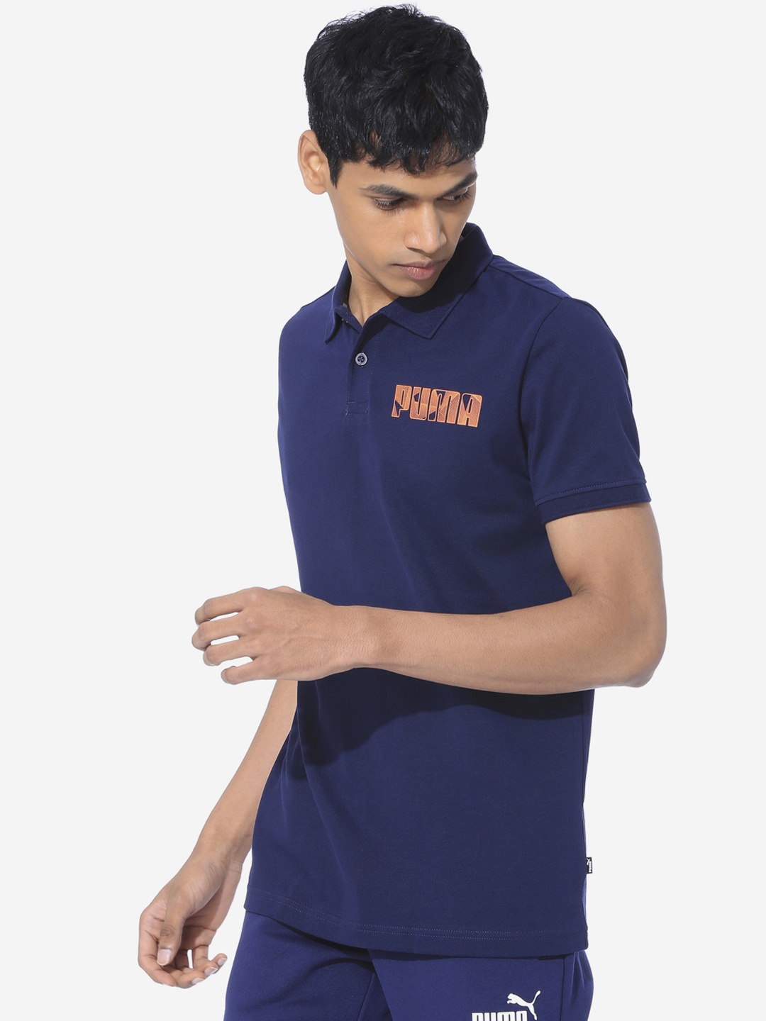 

Puma Men Blue Solid Polo Collar Graphic Polo II Peacoat Sports T-shirt