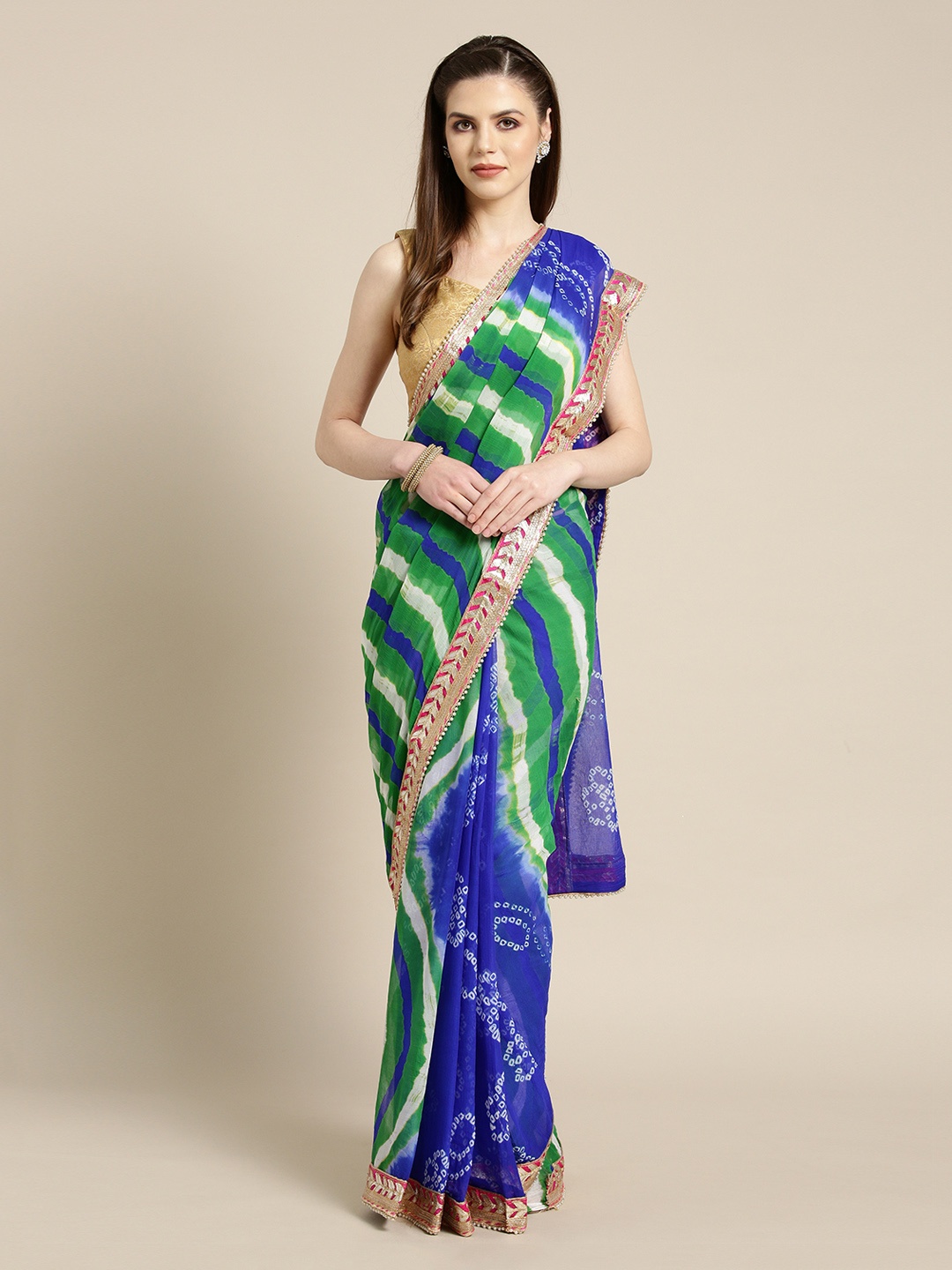 

Geroo Jaipur Hand Dyed Blue & Green Bandhani Chiffon Sustainable Saree