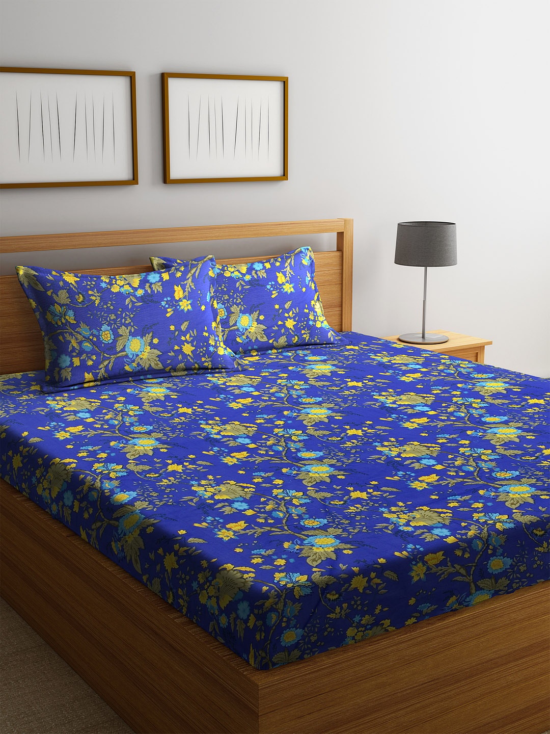 

Cortina Blue & Yellow Floral 144 TC Cotton 1 Double Queen Bedsheet with 2 Pillow Covers