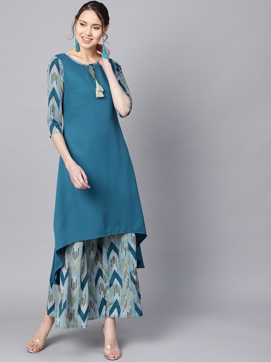 

Azira Women Teal Blue & White Printed Kurta with Palazzos