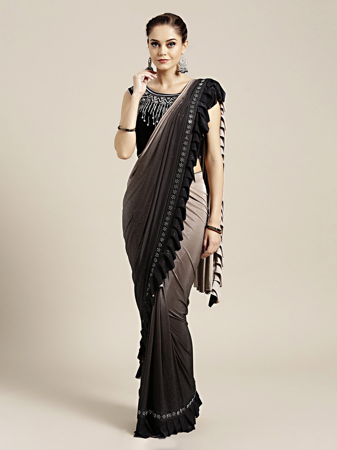

Mitera Black & Grey Poly Georgette Embellished Saree