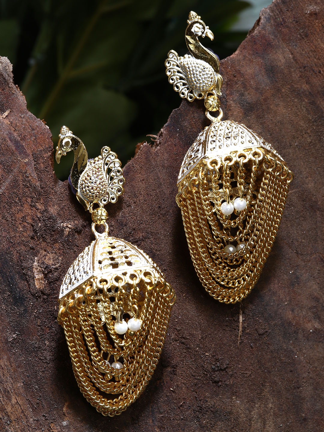 

ANIKAS CREATION Gold Plated & White Enamelled Peacock Shaped Jhumkas