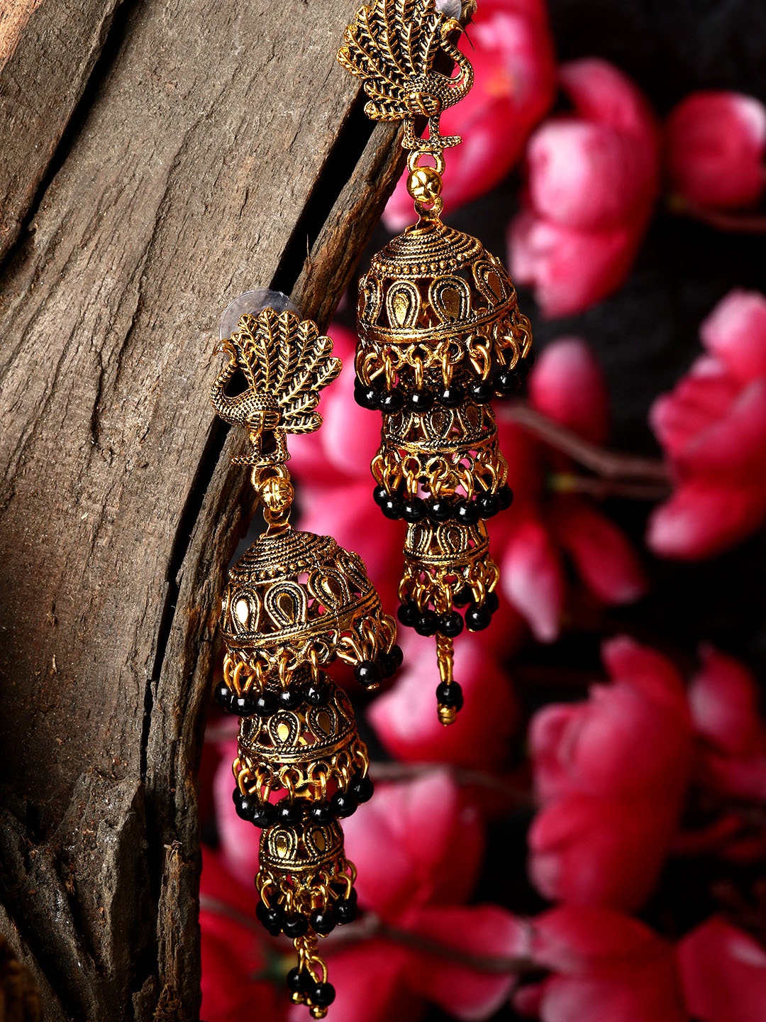 

ANIKAS CREATION Gold Plated & Black Peacock Shaped Enamelled Jhumkas