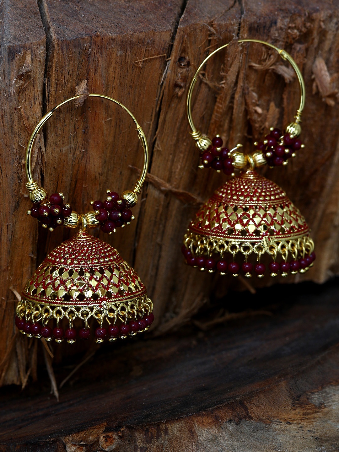

ANIKAS CREATION Maroon & Gold-Plated Enamelled Dome Shaped Jhumkas
